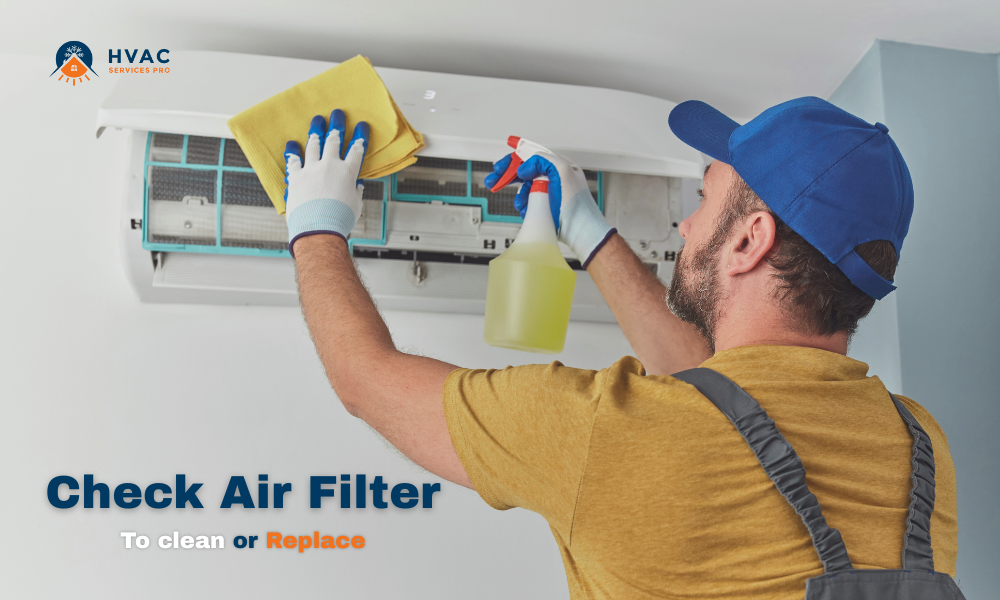 A technician in a blue cap and gloves cleans an air conditioning unit’s filter with a cloth and spray bottle. Text reads, "Check Air Filter to clean or replace."