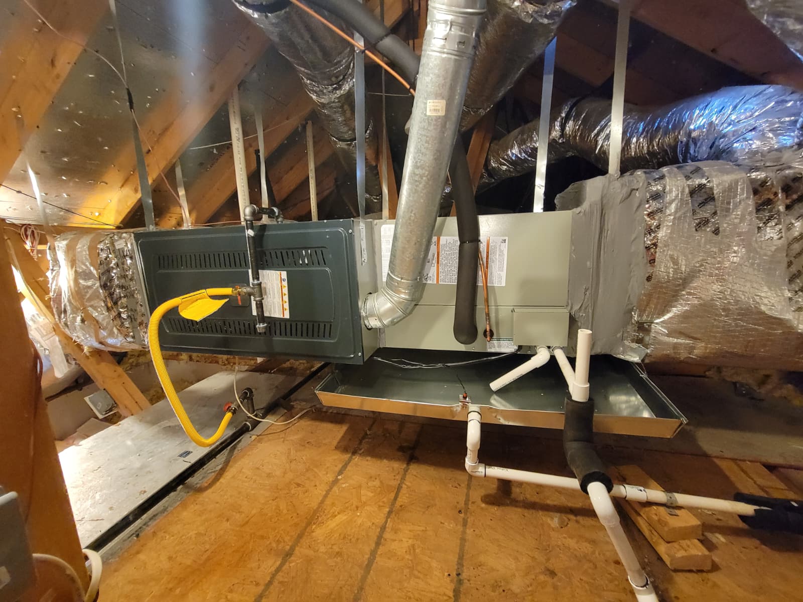 Plano attic furnace and coil installation